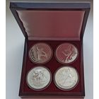 100 рублей 4 монеты, 622 грамма серебра, монеты НБ РБ весом в 5 унций серебра каждая посвященные спорту: Гандбол, Фигурное катание, Чемпионат мира по футболу, Лыжные гонки. Малые тиражи