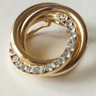 Брошь- дресс- клип. " Лента Мёбиуса" Винтаж.  Позолота. Фианиты. 3х1 см.