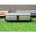 Вагон  грузовой  2-х осный (сер-кор)  "KleinBahn" б/у 1/87 HO