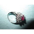 Перстень со множеством ярких фианитов и камешком рубинового цвета, р.17. Новый!