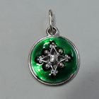 Кулон мельхиоровый посеребренный с зелёной эмалью. Диаметр 2.5 см.