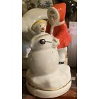 Девочка лепит снеговика 1960 годы