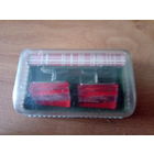 Запонки с зажимом.