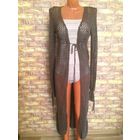 Стильный вязанный кардиган на 42-46 размер. Смотрится очень интересно. Длина 135 см. Стильная вещица. Цвет песочный.