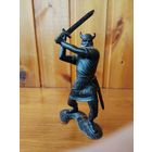 Фигурка викинга.