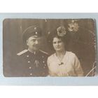 Фотография Титулярного советника с супругой. Медаль "За усердие" на Станиславской ленте. Российская Империя. До 1917 года. 13,5 на 8,5 см.