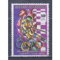 [819] ЦАР 1990. Спорт.Зимние Олимпийские игры.Лыжи. Гашеная марка.