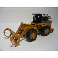 Трактор-погрузчик CATERPILLAR электрофицирован