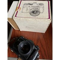 "Зенит-ЕТ" на отличном объективе, кофре и коробке по-родне! Отсюда и цена.