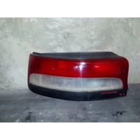 Фонарь задний левый Mazda 323 BG