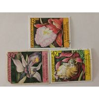 Марки из серии "Орхидеи" - Дремлик болотный (Epipactis palustris), Лимодорум недоразвитый (Limodorum abortivum) и Венерин башмачок настоящий  (Cypripedium calceolus)