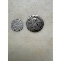 Серебряная пара монет.