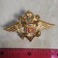 Не частая кокарда, тулия на фуражку сотрудника милиции  (полиции) МВД России. Пластмасса. Ранний вариант. Производство г. Харьков, Украина.