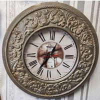 Часы настенные в массивной металлической раме, 80-е годы.