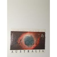 Австралия год 1992.  уманность Улитка (Helix Nebula) и олимпийские кольца.