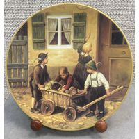 Фарфоровая настенная тарелка Vohenstrauss Johann Seltmann из серии Утерянные детские портреты Франца фон Дефреггера. 1995 год. 19.5 см.