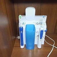 Зубной центр Braun Oral-B  ирригатор + электрическая зубная щетка