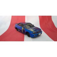 Машинка (модель) Bburago 1:43 Subaru Impreza WRX STI