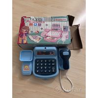 Новая игрушечная касса