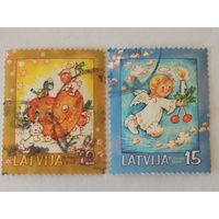 Две марки из серии "Счастливого рождества" - Рождественский сюжет и Ангел