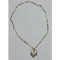 Кулон с кристаллами "Сердце" на цепочке 90-е годы Европа. Длина цепочки 48 см. Размер кулона 2-3 см.