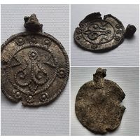 Медальон,  геральдический сюжет.