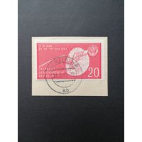 ГДР 1959 Марка на вырезке "Полет советского спутника "Луна-2" к Луне" (гашение) Mi.721 каталог 1.00 евро