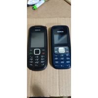 Мобильники Nokia 1209 и 1661.