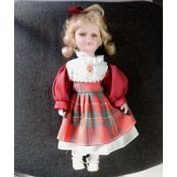 Кукла фарфоровая 80-е годы Европа. Длина 31 см.