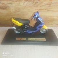 Скутер "PEUGEOT".1:18.