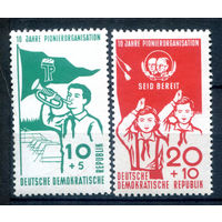 ГДР - 1958г. - 10 лет пионерской организации Эрнста Тельмана - 2 марки - полная серия, MNH, 1 марка с отпечатком на клее [Mi 645-646]. #1-GG-12-A-2