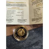 Золотая монета славянка