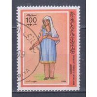 [1463] Ливия 1984. Культура.Женский костюм. Гашеная марка.