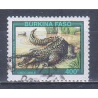 [1610] Буркина Фасо 1995. Фауна.Рептилии.Крокодил. Концовка серии.Гашеная марка.