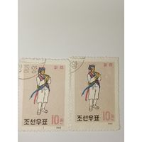 Корея 1963 год   На марках изображен человек, играющий на корейском духовом инструменте.