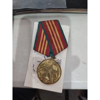 10 лет выслуги в КГБ СССР.