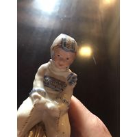 Мальчик  на  санках  рига в синей  шапочке  продан