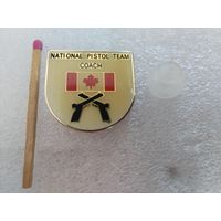 Знак. Тренер Национальной сборной Канады по стрельбе из пистолета. тяжелый