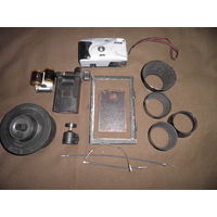 Фото принадлежности разные,ф-т SKINA,тросики,бленды,проявочный бочок,фотокассета,штативная поворотная головка,приспособление для просмотра кадров пленки.С рубля.