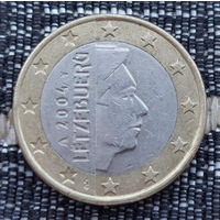 Люксембург 1 евро 2004 года. Король. Клеймо Гастауер-Клер Иветта. Парусник и Посох Меркурия.