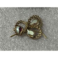 Брошь.