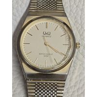 Часы "Q*Q"