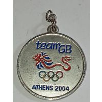 Олимпийская медаль 2004 года .