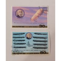 Две марки из серии "Транспорт" - Граф Фердинанд фон Цеппелин (70-я годовщина смерти), дирижабль LZ-4 и Дирижабли "Цеппелин"